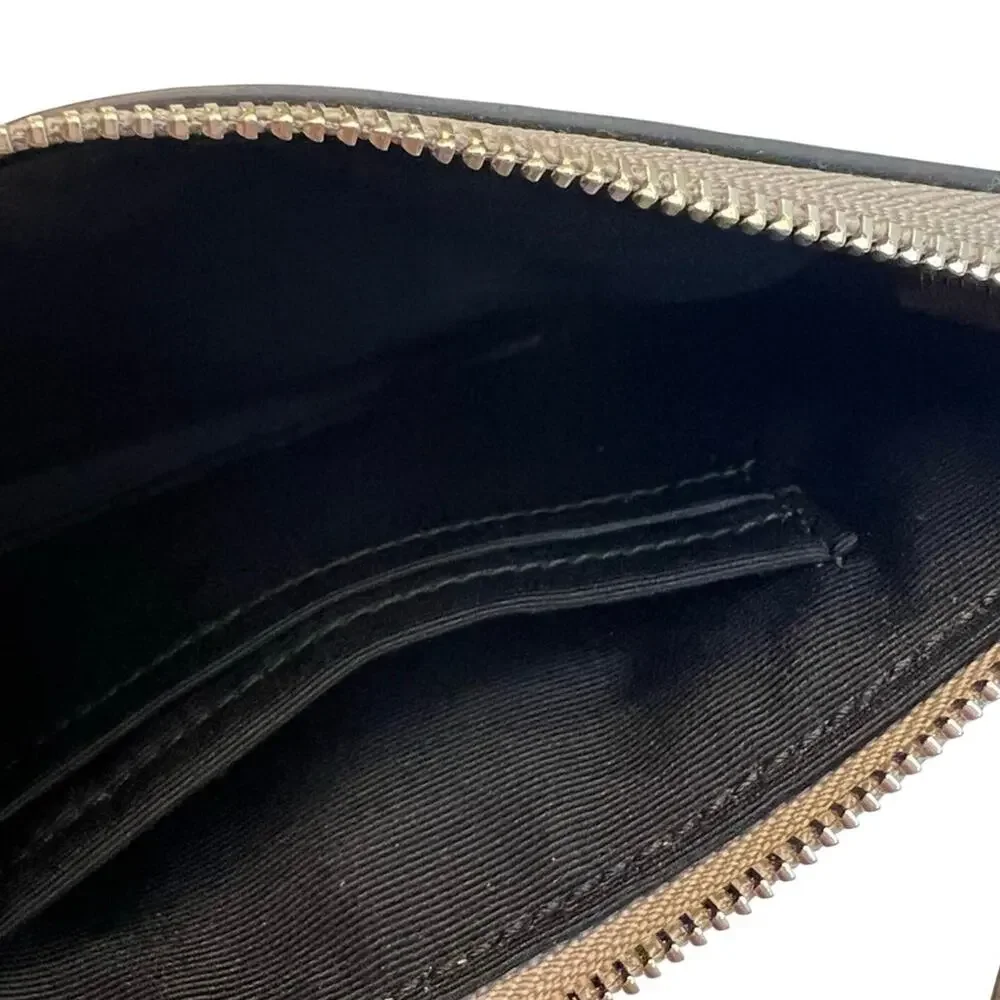 EUC Coach Metallic Silver Wristlet with Bow Detail